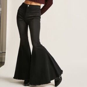Banjul extremely oversized wide leg jeans belted and key holes on waist sides
